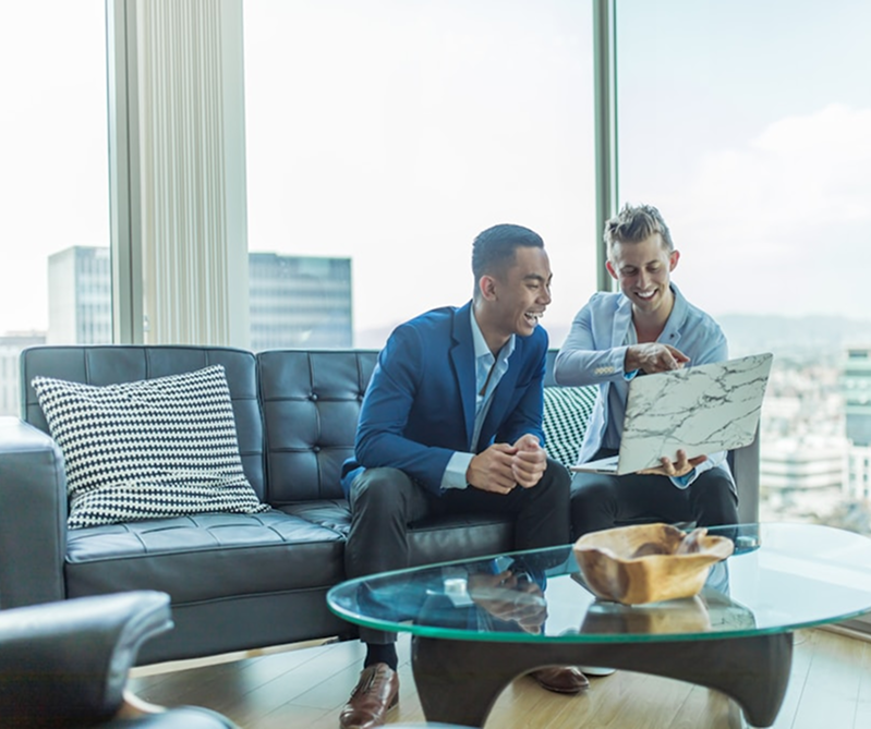 Screenshots of responsive website designs on phone and desktop